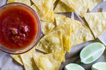 Bake your own Homemade Tortilla Chips in 10 minutes! Extra thin tortillas ensure crunchy snacks every time, perfect for salsa and guacamole.