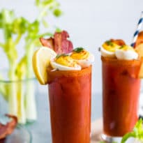 Inspired by all the crazy ideas I've seen over the years, my Bacon and Eggs Bloody Mary combines homemade bloody mary mix, crispy bacon, and deviled eggs. This brunch superstar is now a completely breakfast! 