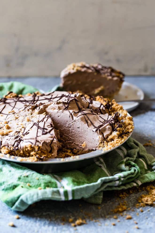 With a homemade graham cracker crust and a creamy, no-bake filling, this frozen Chocolate Cream Pie is the ultimate make-ahead dessert!