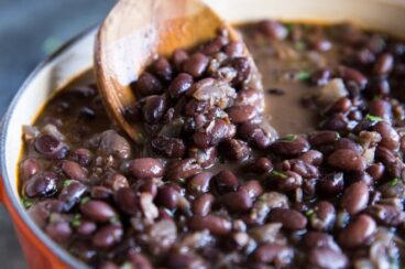 These copycat Chipotle Black Beans are easy to make, inexpensive, and healthy! Add to burritos and salads or serve with rice for a tasty vegetarian meal.