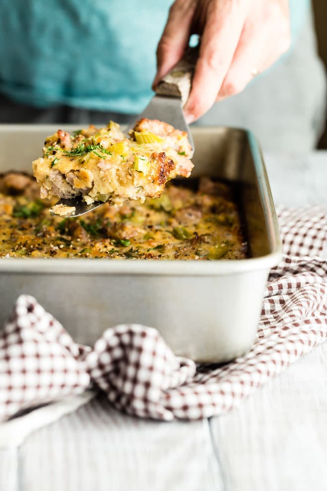 This easy Cornbread Dressing with sausage is baked outside the bird but still so buttery and moist! Bring a taste of the South to your Thanksgiving table.