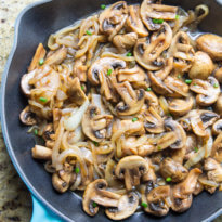 Balsamic Mushrooms and Onions in a blue skillet.