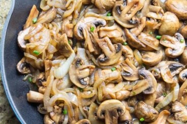 Balsamic Mushrooms and Onions in a blue skillet.