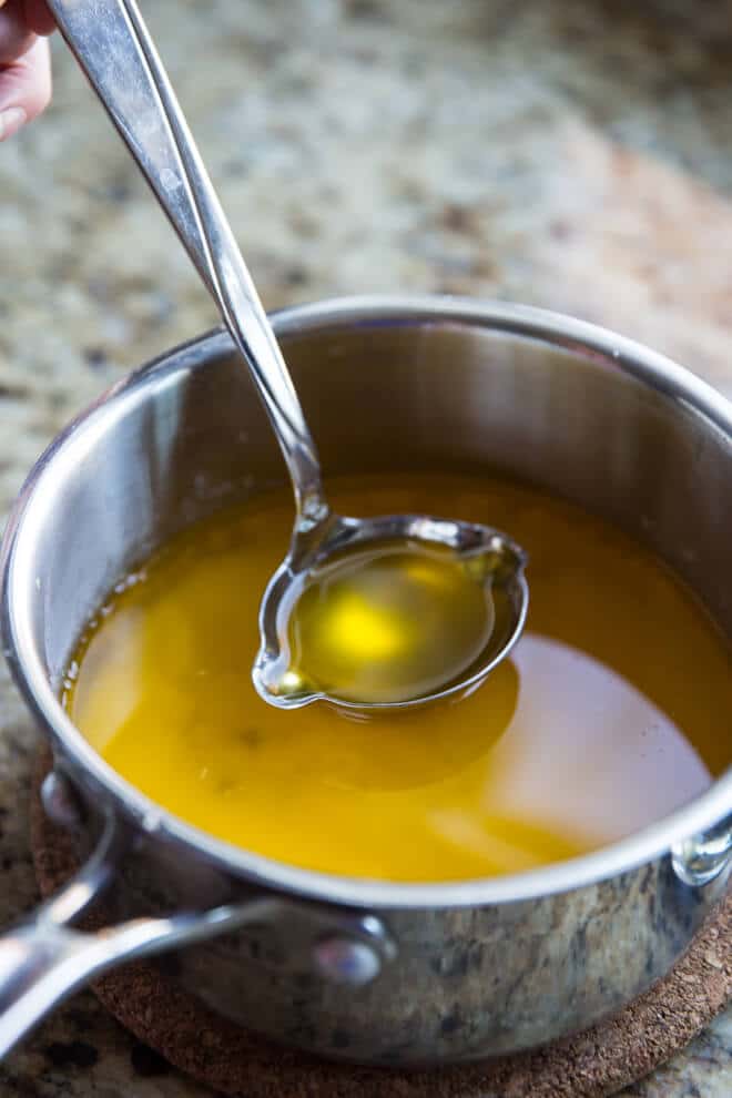 Learn how to make clarified butter (ghee), an easy process that removes the water and milk solids from whole butter. Clarified butter tastes great, lasts longer in the refrigerator, and has a higher smoke point for cooking.