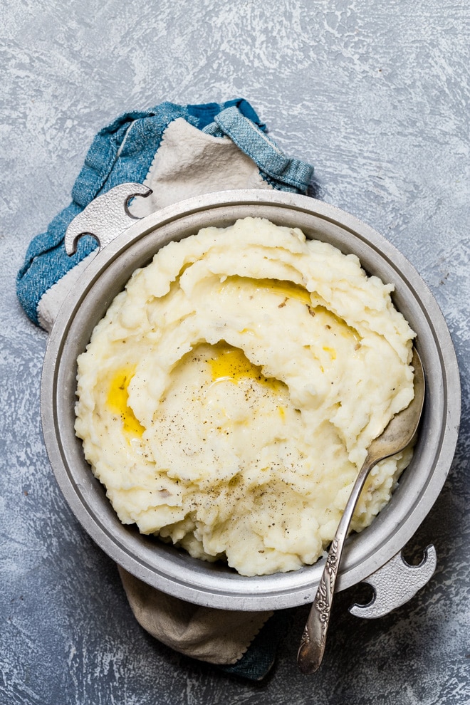 The Best Mashed Potatoes in the world barely even need a recipe, they're so easy to whip up. All it takes is three ingredients to make perfect homemade potatoes that absolutely hit the spot with every fluffy forkful.