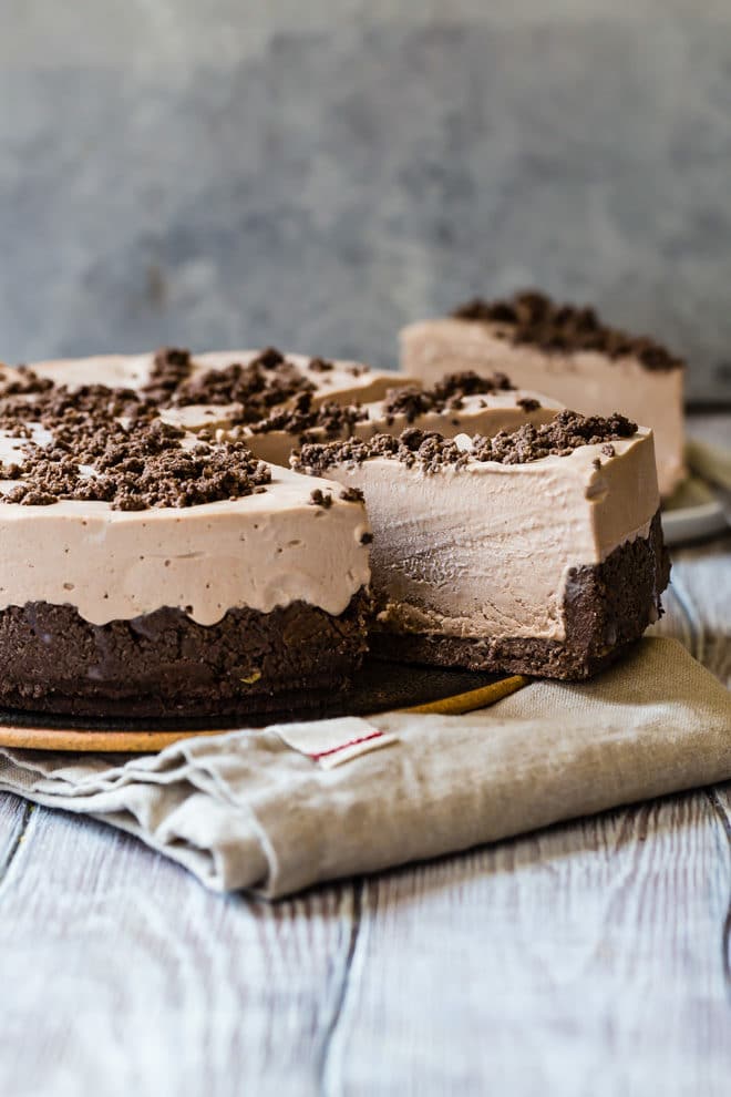 My grandma's famous Frosty Chocolate Cheesecake has a chocolate cookie crust and a creamy chocolate cheesecake filling. And it's best served ice cold!