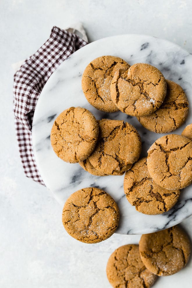 Molasses cookies on a gray platter.