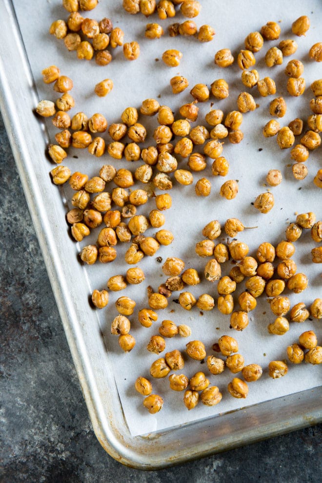 Chickpeas on a baking sheet.