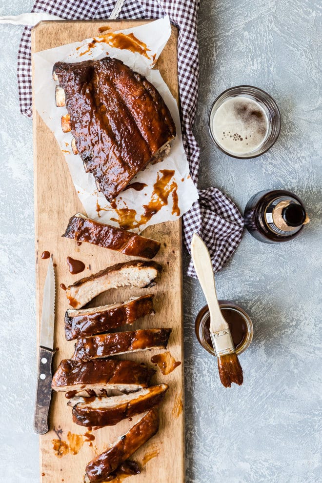 Ribs on a wooden cutting board.
