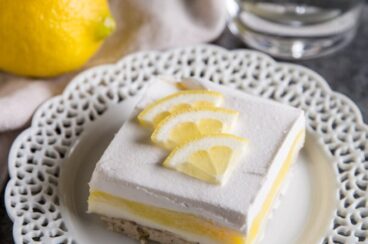 Lemon Lush is an easy dessert recipe made with layers of pecan shortbread, sweetened cream cheese, lemon pudding, and whipped topping. Rediscover this classic summer dessert or enjoy it for the first time. You'll want to go light on dinner so you have plenty of room left for Lemon Lush!