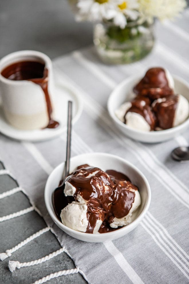 Delightfully delicious and easy to make, this chocolate sauce is a straightforward ganache that is the perfect topping for ice cream, cake, or any homemade dessert in your recipe box. Glossy, luscious, and pleasing to the eye and palate, you’ll never buy store bought chocolate sauce again!