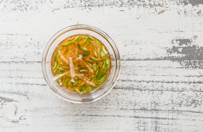 Once you discover how easy it is to make a big batch of nuoc cham, a lively Vietnamese dipping sauce, you'll probably always have some on hand to throw over noodles, grilled meat, or salads. I serve it as a condiment for both fresh and fried spring rolls, too.