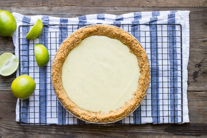 A key lime pie before being topped with whipped cream.