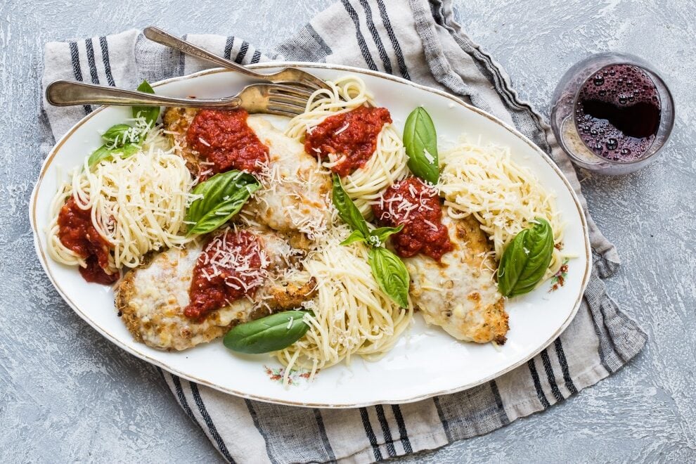 To me, Chicken Parmesan is comfort food like no other, perfect any night but especially when the days get shorter, and there’s a bit of a chill in the air. This hearty recipe for a delicious, easy Chicken Parmesan with pasta and a homemade tomato sauce will make everyone at the table ask for seconds, maybe even thirds. 