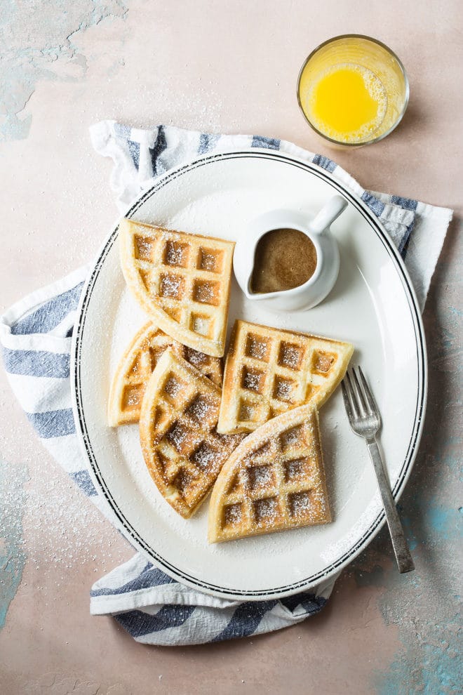 If you don’t have a classic waffle recipe in your morning repertoire, this weekend may be the time to dust off that waffle iron and make some crispy, crunchy, delicious memories. Syrup covered memories. 
