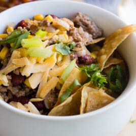 Easy taco soup in a white bowl.