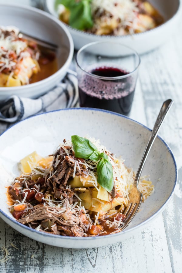 A beautiful and effortless Northern Italian recipe, this Slow Cooker Beef Ragù with Pappardelle is warm and welcoming after a long day at work. Slow-braised beef, tomato, carrots, onions, and a hint of red wine cooked until it practically melts over the noodles--there's no better way to eat. 