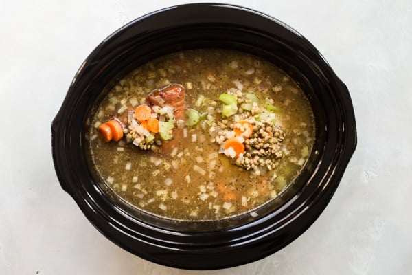 This Ham and Lentil Soup recipe is perfect for chilly weather and cooks up in about an hour; all you need is a loaf of French bread for a cozy winter’s feast. Put your leftover ham to work and make it on the stove, in a pressure cooker, or in your crockpot!