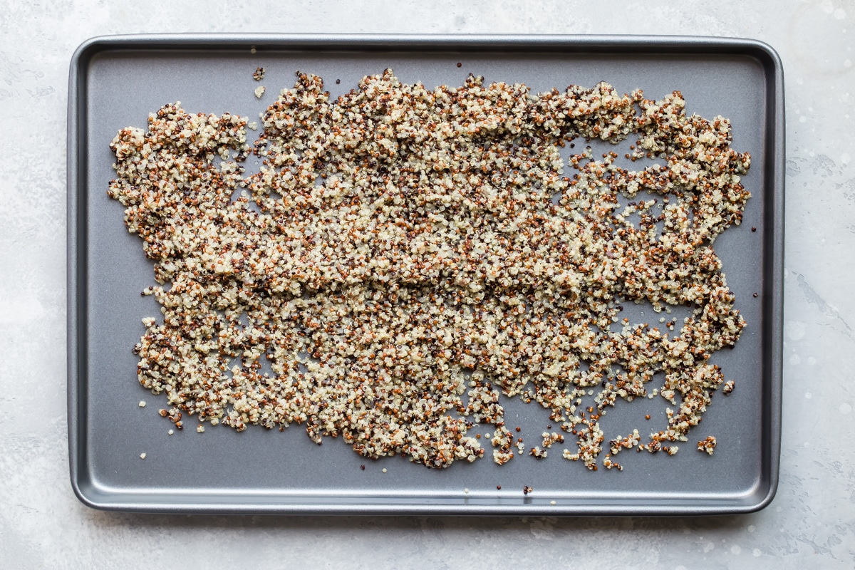 Quinoa on a baking sheet.