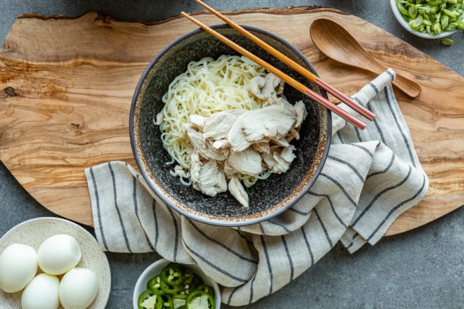 An easy recipe for Chicken Ramen soup. Prep all your ingredients ahead and you can have delicious homemade chicken ramen on the table in 15 minutes or less.