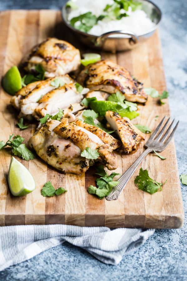 This easy recipe for Cilantro Lime Chicken is full of flavor and so easy for busy weeknights. Make a simple marinade with cilantro, lime, garlic, and spices, then cook it in a skillet or on the grill. Serve with my favorite Cilantro Lime Rice, grilled veggies, or tortillas for a fast and tasty dinner.