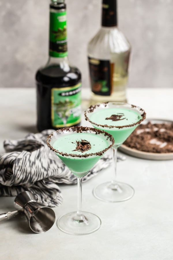 Two grasshopper cocktails in martini glasses.