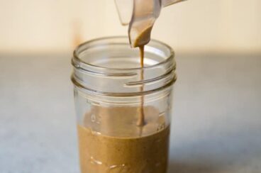 Homemade tahini is an amazing pantry staple that adds richness and dimension to hummus, cookies, and salad dressings. If you have a high powered blender or food processor, tahini is also wonderfully simple to make. This recipe is  vegan, gluten-free, and completely delicious.