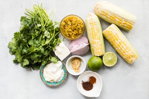 When it comes to summer salads, nothing gets the party started quite like tangy, spicy Mexican Corn Salad, aka esquites. It’s the spoonable, easy-to-eat cousin of elotes, or Mexican Street Corn, and it can’t wait to be on your next summer barbecue menu!
