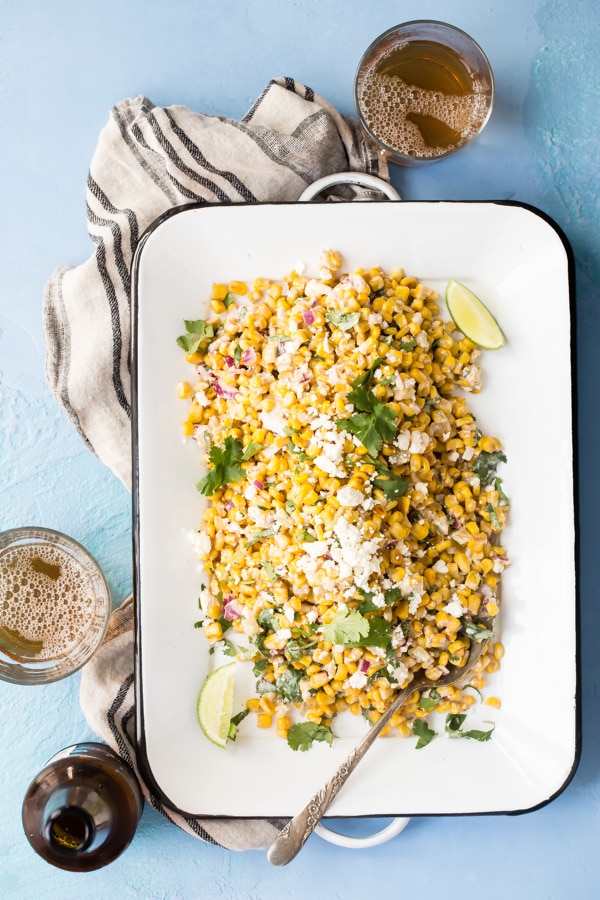 When it comes to summer salads, nothing gets the party started quite like tangy, spicy Mexican Corn Salad, aka esquites. It’s the spoonable, easy-to-eat cousin of elotes, or Mexican Street Corn, and it can’t wait to be on your next summer barbecue menu!