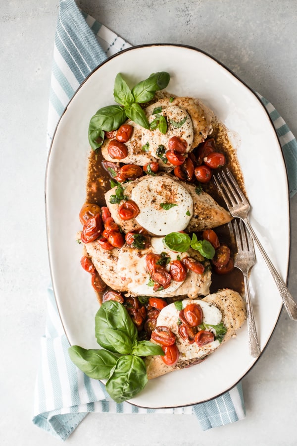This is a chicken recipe you'll return to again and again; no matter when you make it, tomato and basil Caprese Chicken tastes like the height of summer. This recipe uses burst cherry tomatoes and a quick balsamic pan sauce; melted fresh mozzarella makes it irresistible. It's one of the best one pot dinners you'll ever have. 