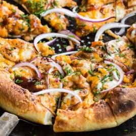 Bbq chicken skillet pizza on a pizza pan.