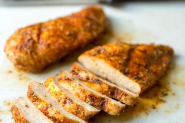 Sliced grilled chicken with rub.
