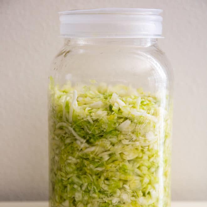 Sauerkraut in a jar with a lid.