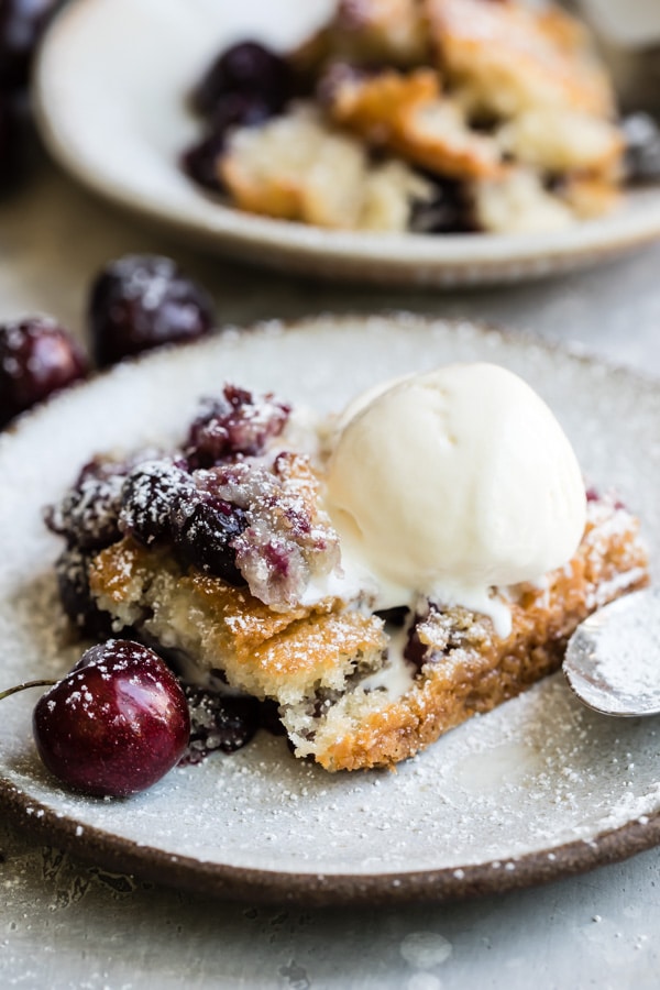 You don’t need cake mix to make this Cherry Cobbler Recipe, just a bunch of fresh cherries and a handful of ingredients you already have. It’s one glorious cherry dessert you’ll probably make a dozen times before summer is over.