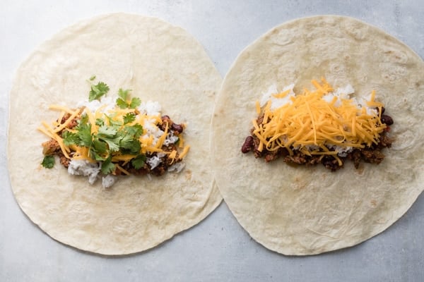 Leftover chili and cheese gets rolled up tight into a flour tortilla for the ultimate midnight snack or quick lunches on the go.