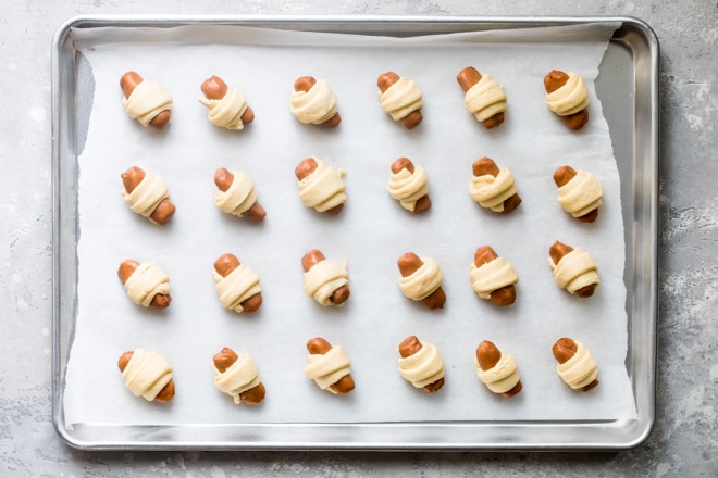 These Easy Pigs in a Blanket take just two ingredients and 20 minutes. Makes a great snack for kids or double the batch for your next party!