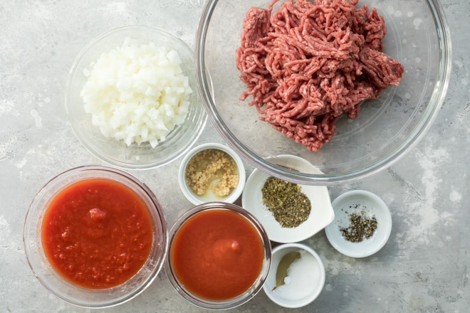 The BEST Homemade Meat Sauce has both beef and Italian sausage. It's perfect in lasagna or on spaghetti, and it comes together with easy pantry ingredients.
