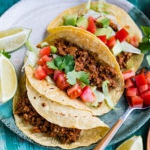 Three Ground Chicken Tacos on a blue plate