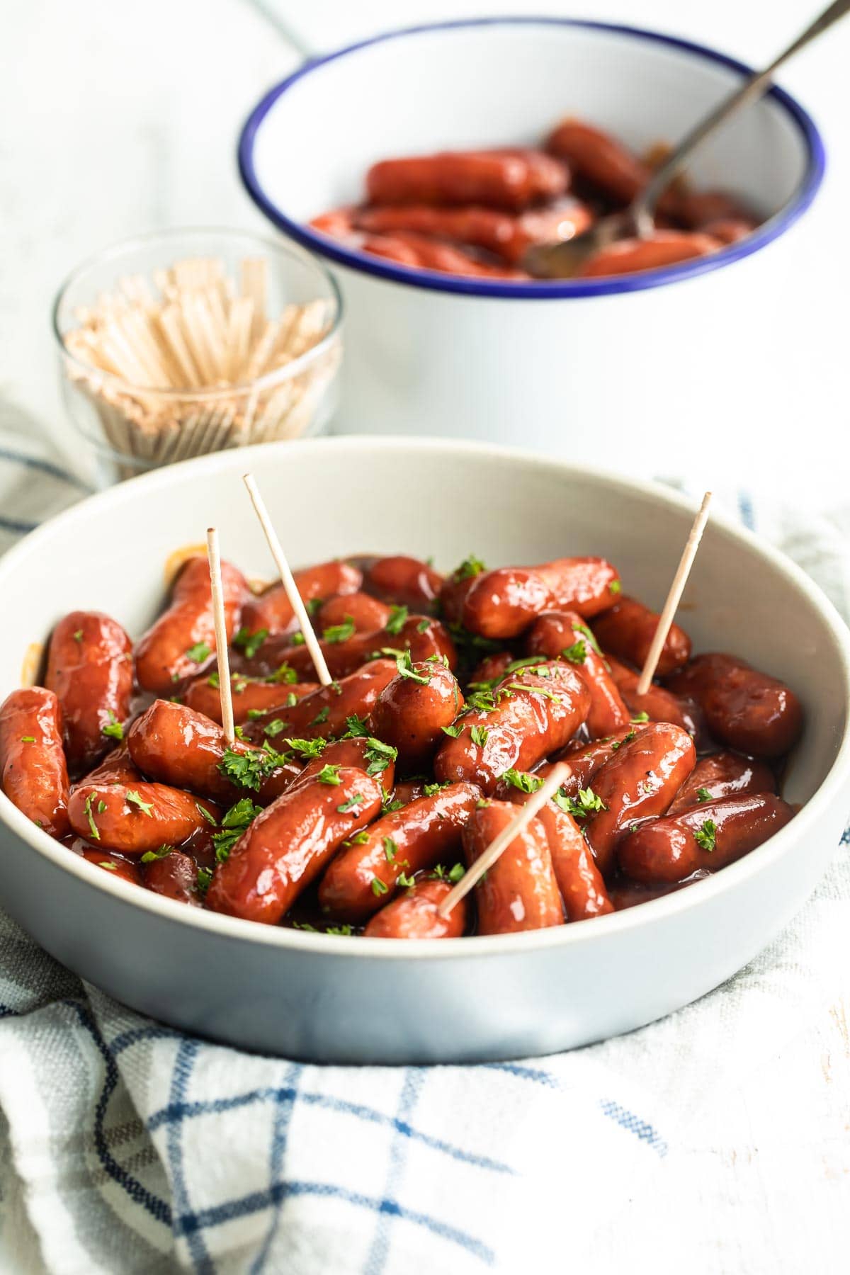 2 ingredient barbecue little smokies in a white bowl.