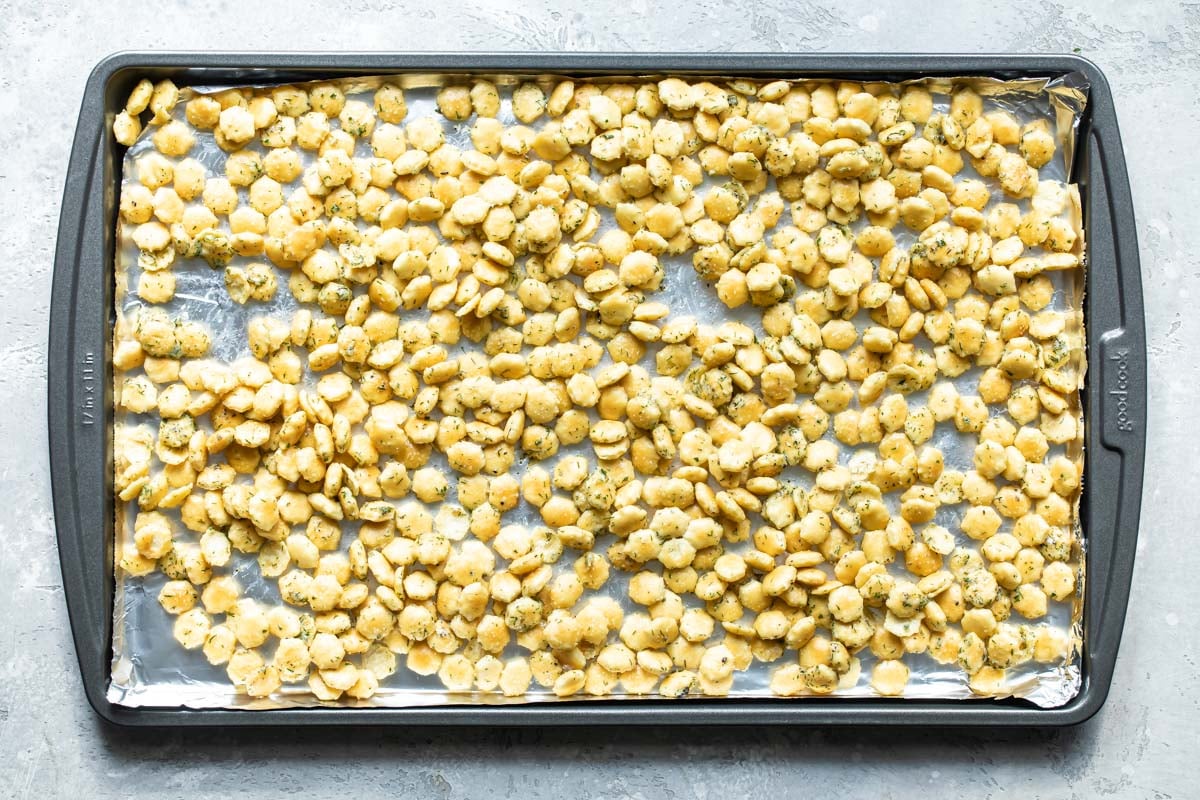 Ranch oyster crackers on a baking sheet.