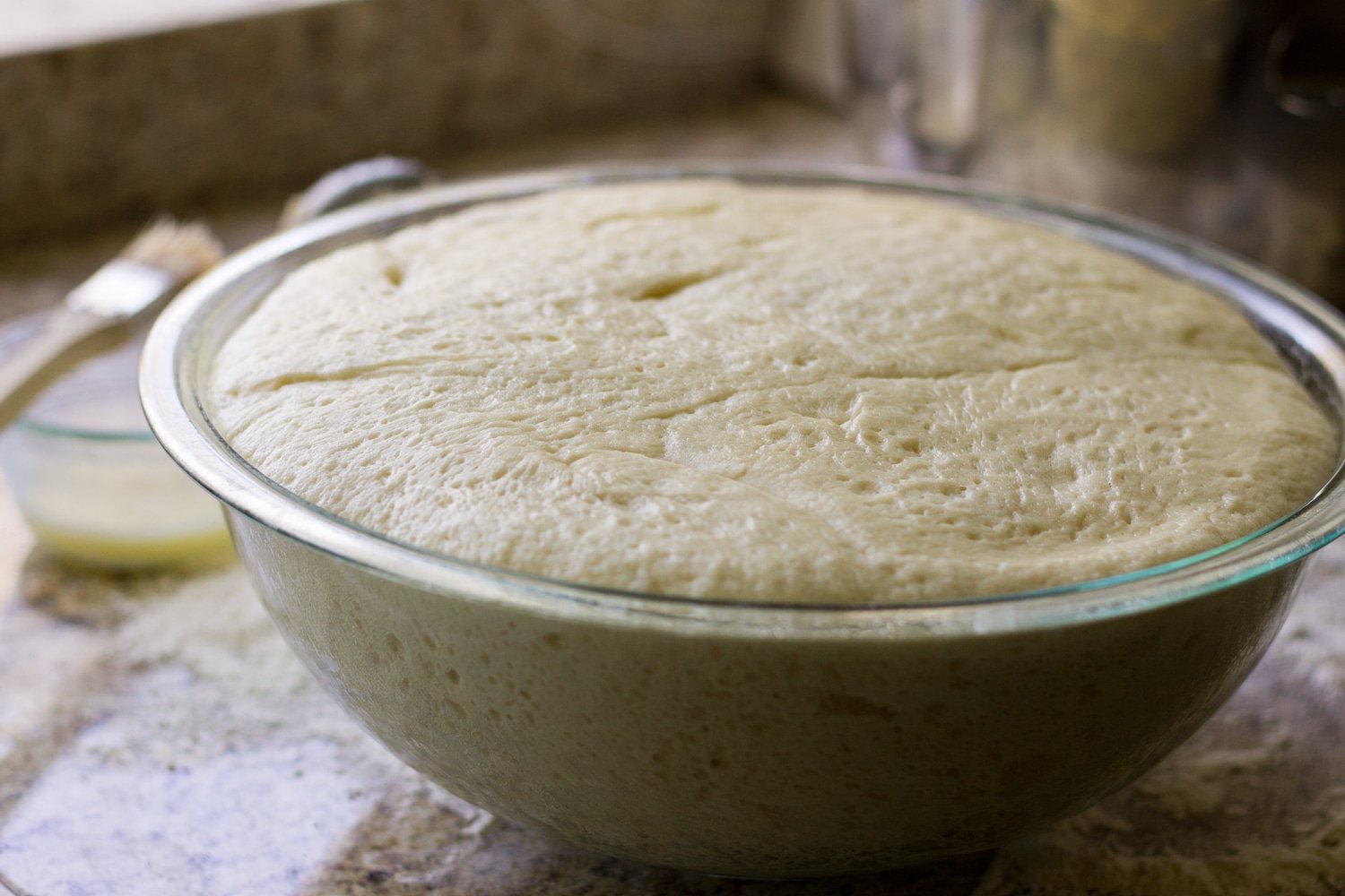 Dough in a bowl after proofing.