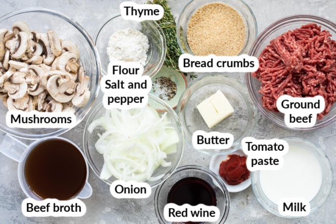 Labeled ingredients in bowls for salisbury steak.