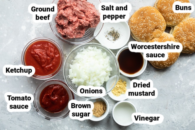 Sloppy joe ingredients labeled and in various bowls.