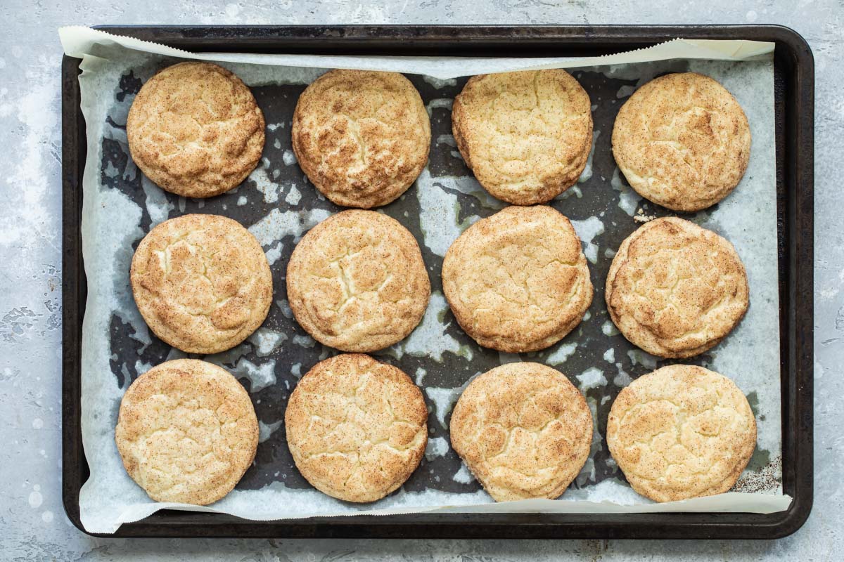 Snickerdoodle cookies on a baking sheet.