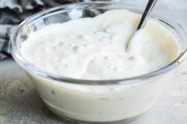 A bowl of blue cheese dressing.