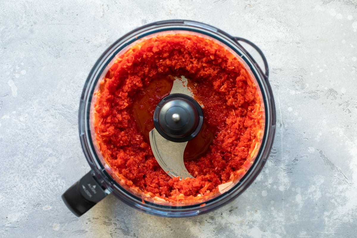 Bell peppers blended in a food processor.