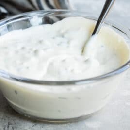 A bowl of blue cheese dressing.