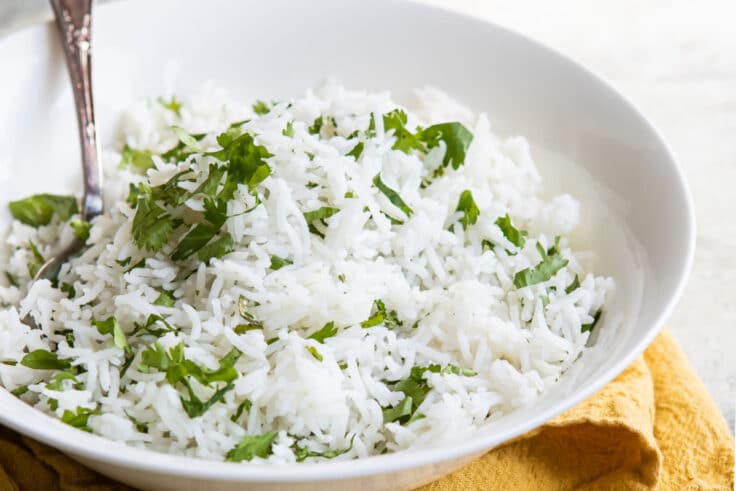 Chipotle cilantro lime rice in a white bowl.