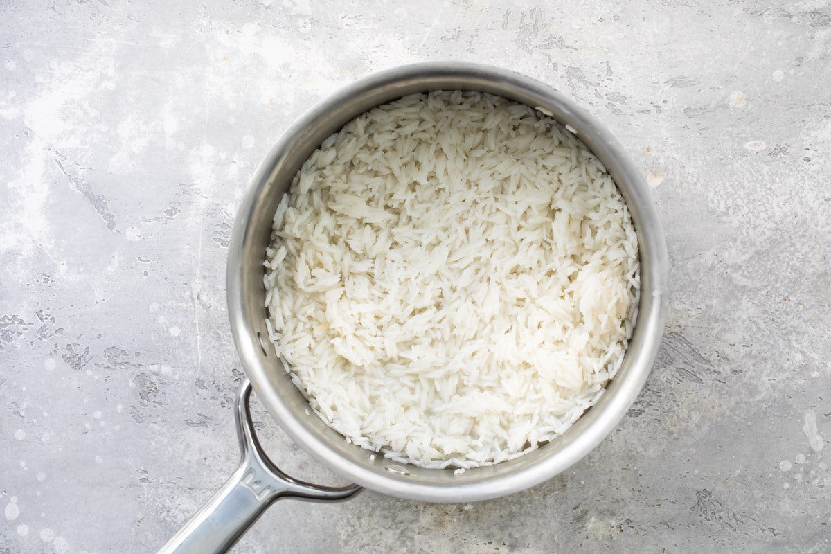 Rice in a silver saucepan.