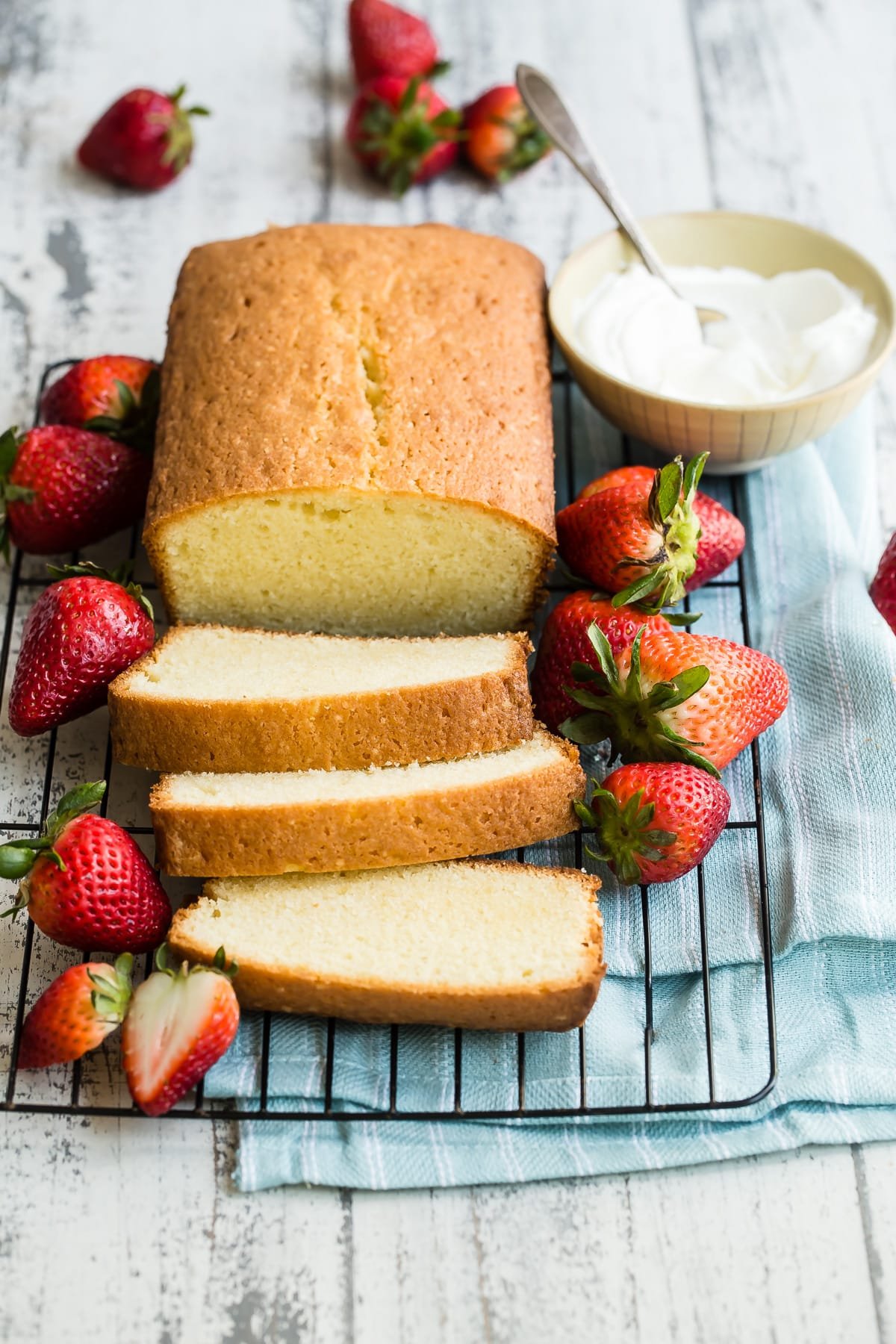 Easy pound cake slices on a cooling rack.
